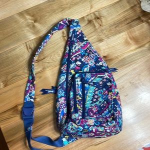 Vera Bradley Disney Sensational Six Sling Backpack. EUC.  Used for one vacation.